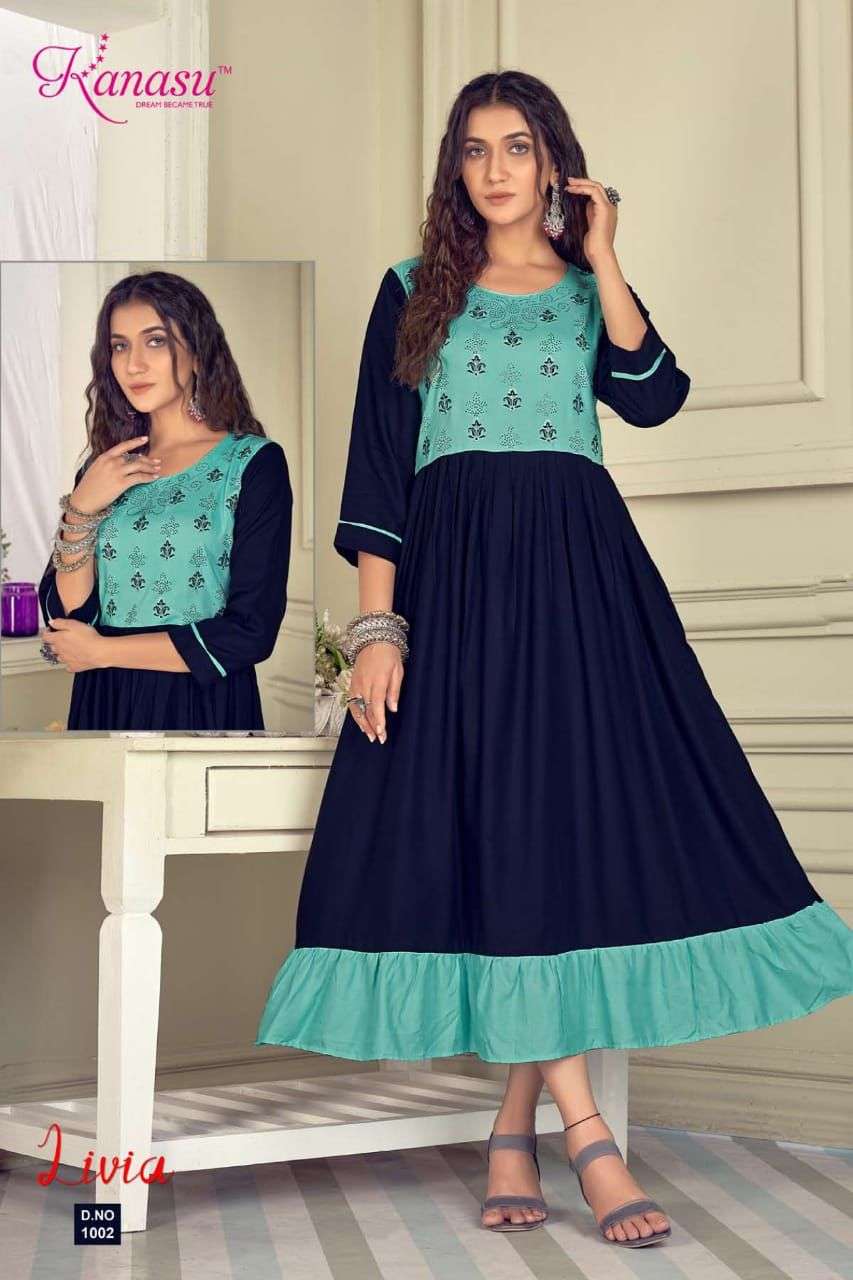 KANASU LIVIA HEAVY REYON LONG & FLAIR EMBROIDERY WITH SWAROVSKI WORK KURTI CATALOG WHOESALER BEST RATE