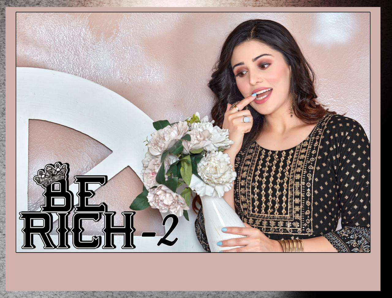 GOLDEN BE RICH 2 HEAVY RAYON PRINT WITH WORK KURTI CATALOG WHOLESALELR BEST RATE